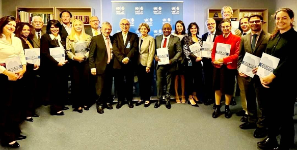 Photo Rector Francisco Rojas Aravena, UPEACE Council members, and authors at the launch.